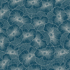 Seamless white pansy pattern on blue background.