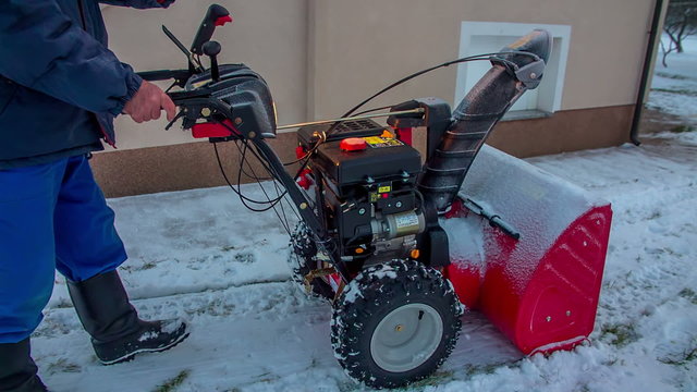 Slowly moving a snowblower around the house