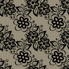 Seamless black lace on beige background