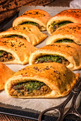 Szczecin pastries- deep-fried yeast dough stuffed with meat or v