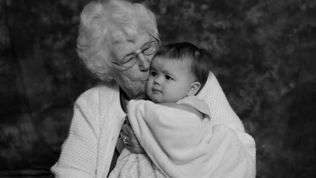 Black and white portrait of grandmother and granddaughter 