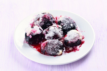 Sugar plums on white plate