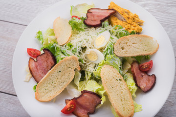 Caesar salad with bacon