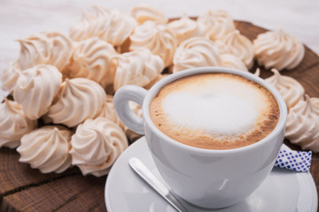 cup of cappuccino with zephyr