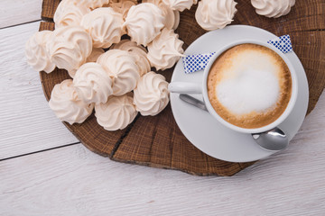 cup of cappuccino with zephyr