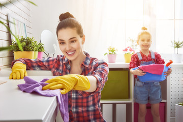 family cleans the room