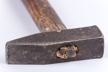 Closeup macro view of old rusty retro hammer