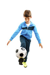 Full length portrait of a child in sportswear jogging with a soccer ball. Isolated on white background. Soccer ball 
