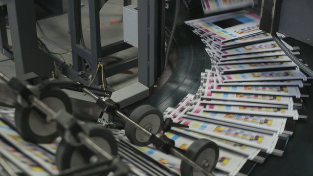 High speed paper on the production line of a printing factory
