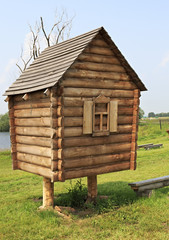 Hut on chicken legs. Wooden sculptures based on Pushkin's fairy tales.