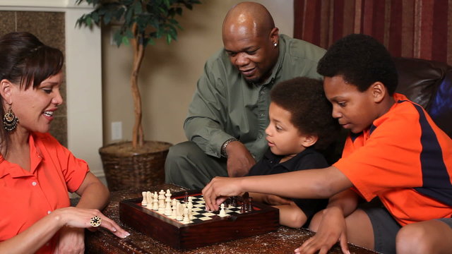 Family playing chess