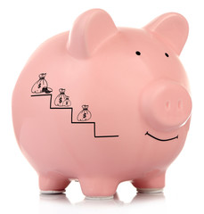 Pink ceramic piggy bank isolated on white