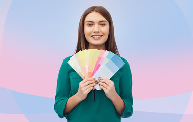 smiling young woman with color swatches