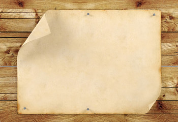 Old blank vintage paper on wood background