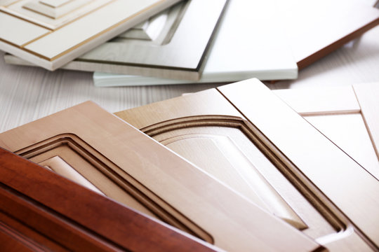 Samples of wooden panels for furniture and door on light table