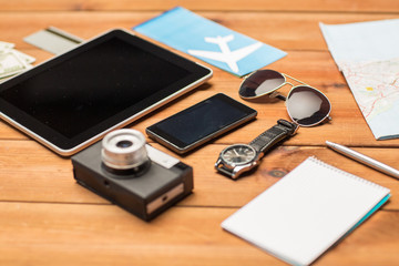 close up of smartphone and travel stuff