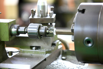 Fototapeta na wymiar Close up shot of cutting tool on a lathe