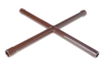 metal cross wrench isolated on white 