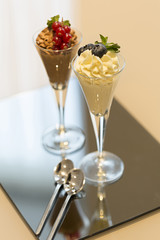 Chocolate and vanilla ice cream served on a table in hotel room
