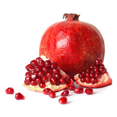 Juicy pomegranate on white background.