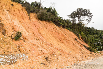 Slope erosion with earth collapse at slope in tropical environme