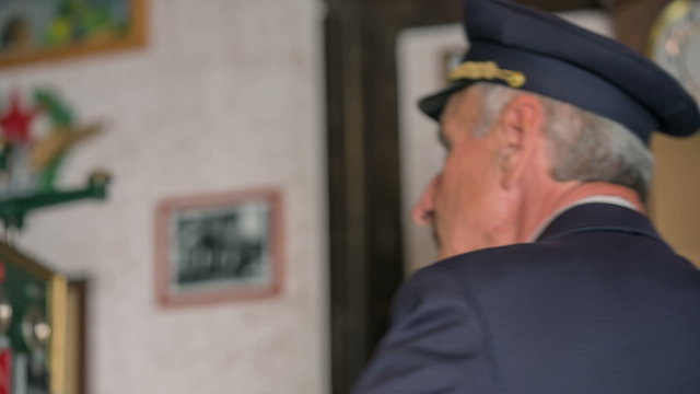 Conductor pulling the leverage at train station 