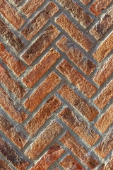 Brick wall. Red  texture. Herringbone (V-shaped pattern). Can be used as background