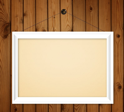 white frame on wood wall background