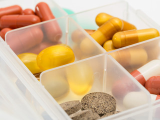 A container for pills with different medicines.