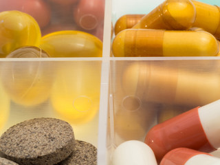A container for pills with different medicines.