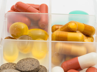 A container for pills with different medicines.