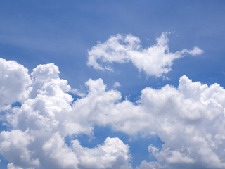 Naklejka na ściany i meble Cloudy blue sky in sunny bright day