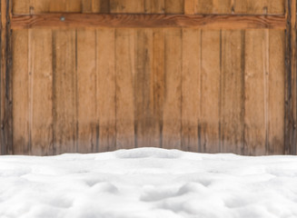 snow and wooden background