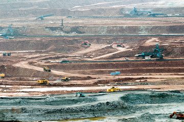Part of a pit with big mining truck working © freedom_naruk
