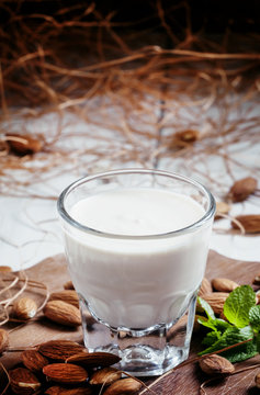 Homemade yogurt in glass in rustic style, selective focus