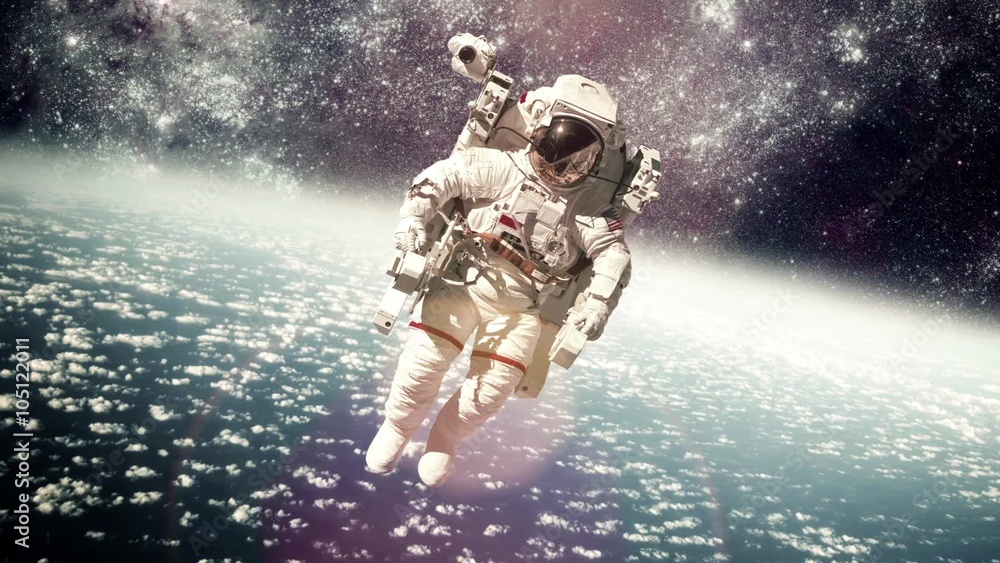 Wall mural astronaut in outer space against the backdrop of the planet earth. elements of this image furnished 