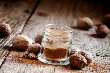 Ground or whole nutmeg, selective focus