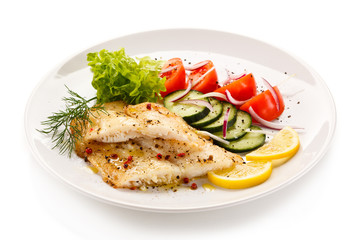 Fish dish - roast cod fillet and vegetables 