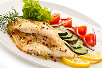 Fish dish - roast cod fillet and vegetables 