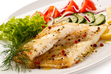 Fish dish - roast cod fillet and vegetables 