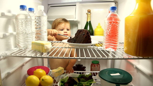Mother catches baby getting into frig