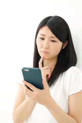 スマートフォン・若い女性