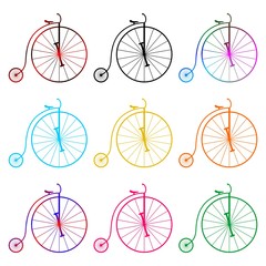 Set of colorful historic bicycles in a row and the row on a white background