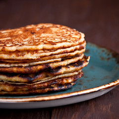Pancakes stack  on wooden table