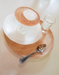 Cappuccino Coffee.The white glass.Serve for you