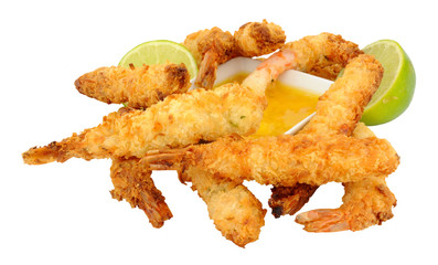 Coconut and batter coated prawns with fresh lime and mango dip isolated on a white background