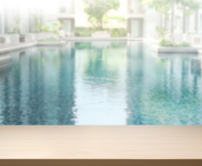 Wood Table Top of Background and Pool