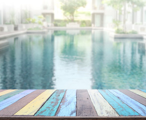 Wood Table Top of Background and Pool