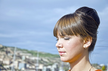 Portrait of young woman outdoors