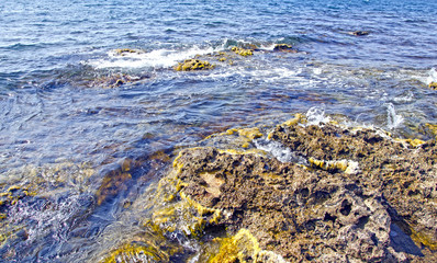 stones over ocean in summer.